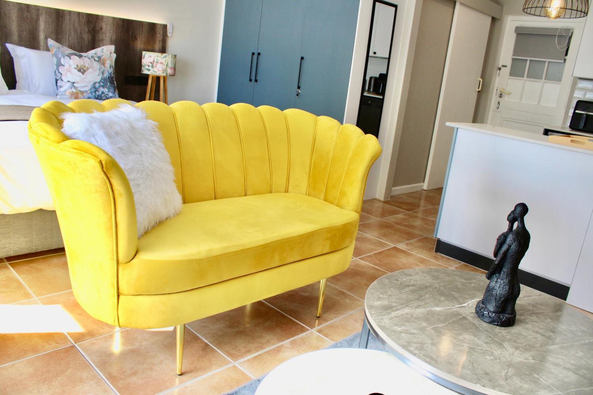 Apartment Yellow Couch 1 Kingbed