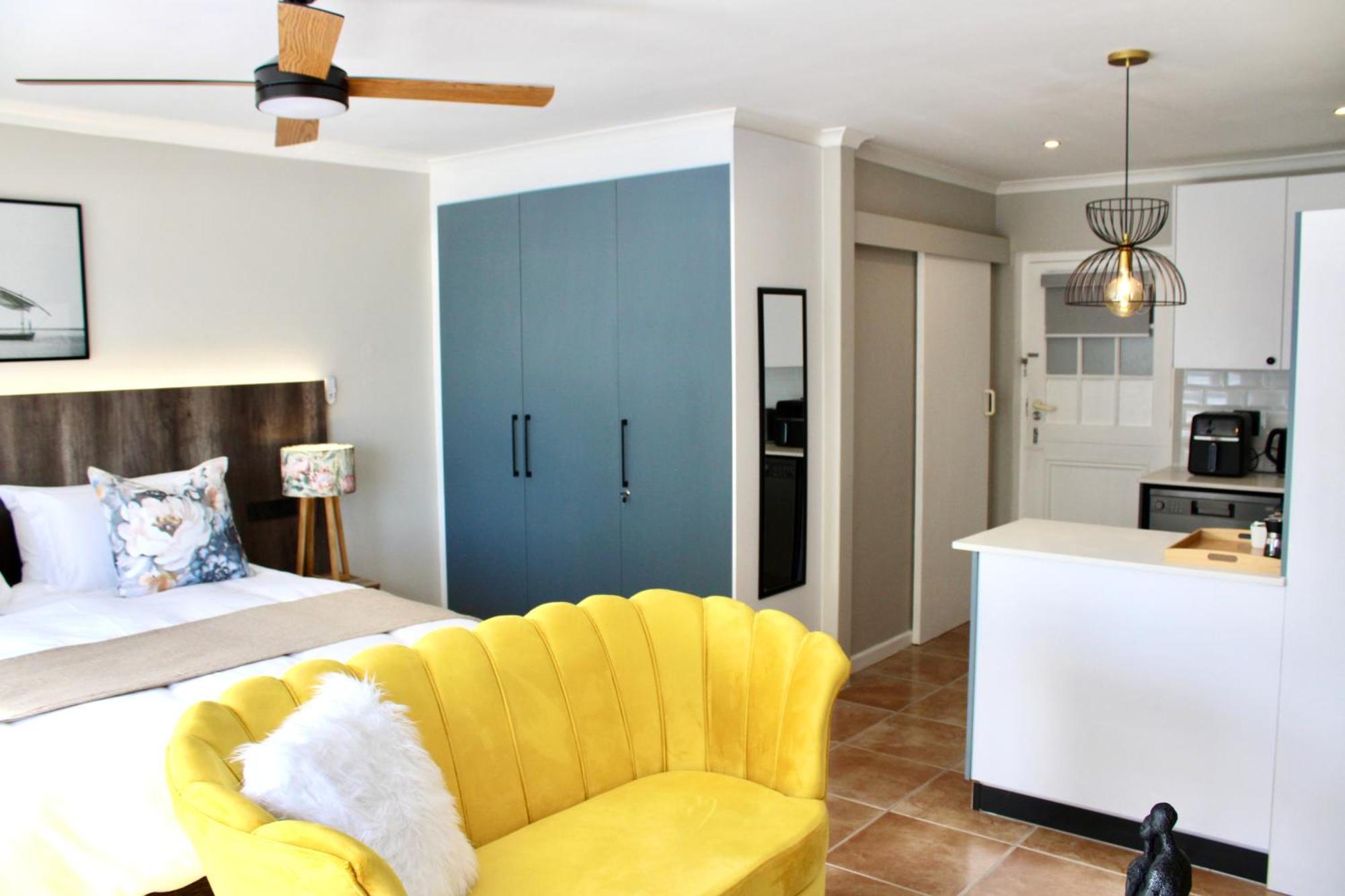Apartment Yellow Couch 1 Kingbed